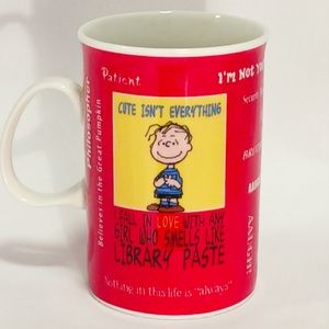 Peanuts red coffee mug featuring Linus.